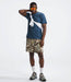 The North Face Mens Dune Sky S/S Crew Shady Blue being worn by model fullbody studio image front view
