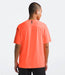 The North Face Mens Dune Sky S/S Crew Vivid Flame being worn by model halfbody studio image back view