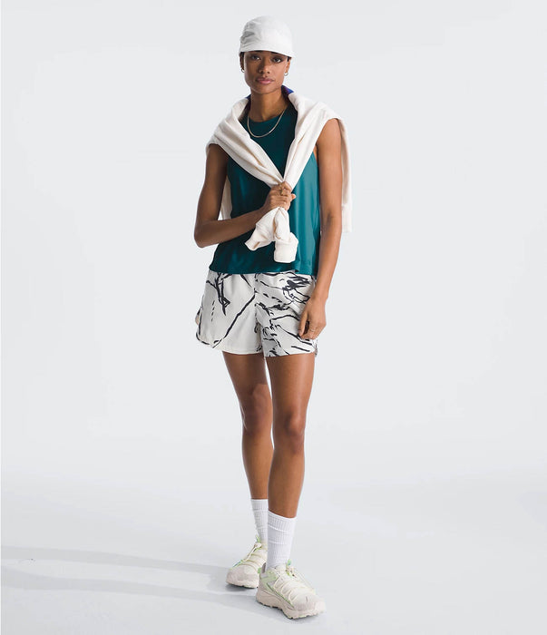 The North Face Womens Dune Sky Standard Tank Blue Moss being worn by model fullbody studio image front