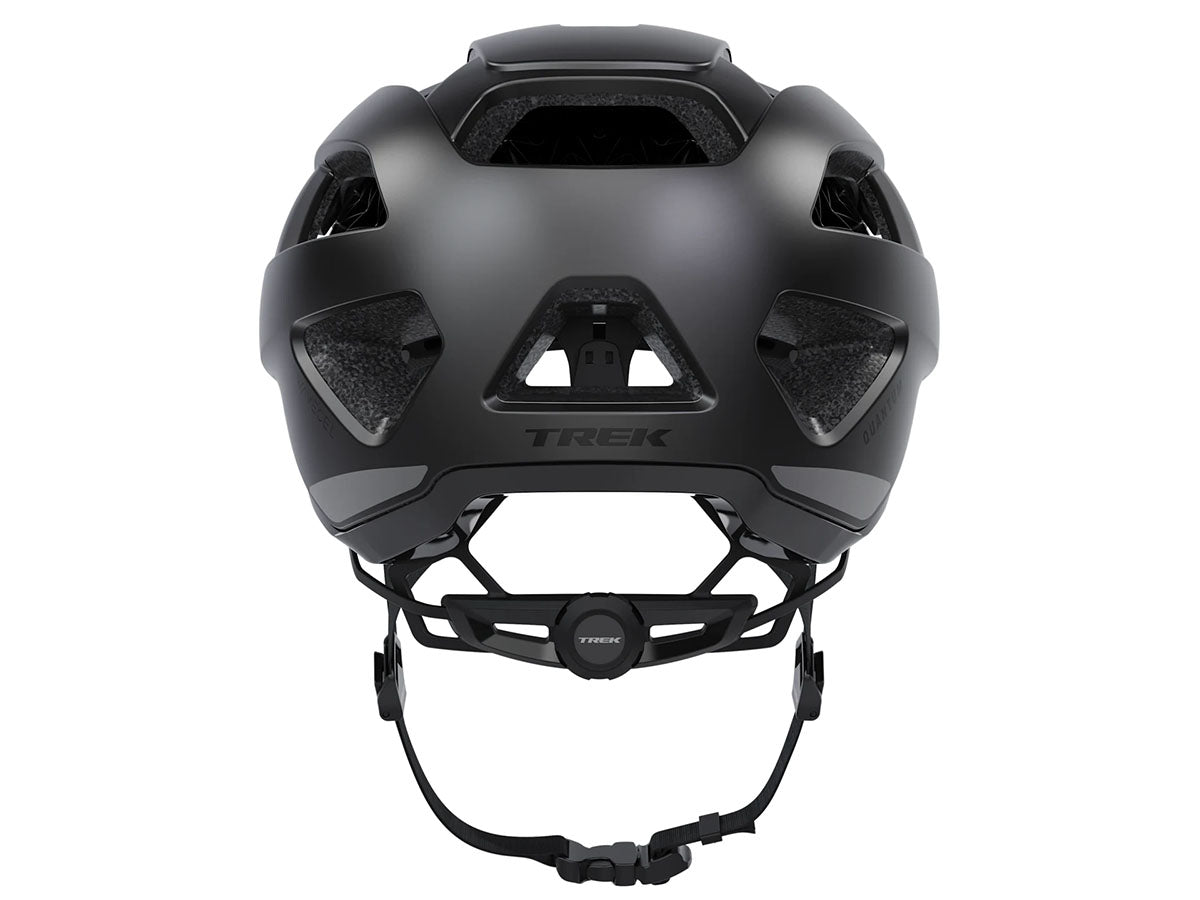 Studio back view of a black bicycle helmet with six ventilation channels visible, a black size adjustment dial and chin strap.