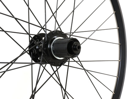 Velocity Dyad 26" 559mm NMSW Black 32h Black Spokes & Silver Nips Standard 135mm Rear Disc Wheel, studio freehub body detail view