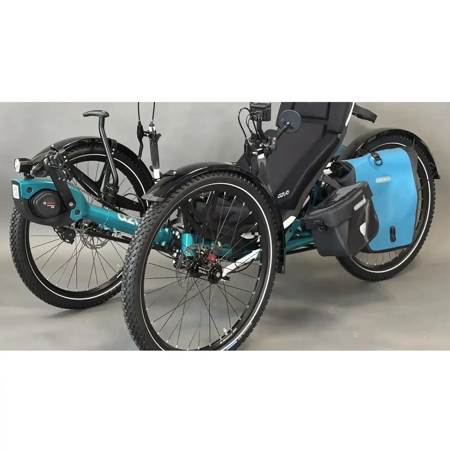 Image of the fenders and mounting hardware for the Azub 26 x 3 inch Ultra-Wide Set of 3 Front and Rear Trike Mudguards mounted on a green trike against a white background.