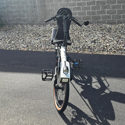 Front view of the Azub Demo Six Bosch Performance CX Dynamic Grey Recumbent Bike in an outdoor setting.