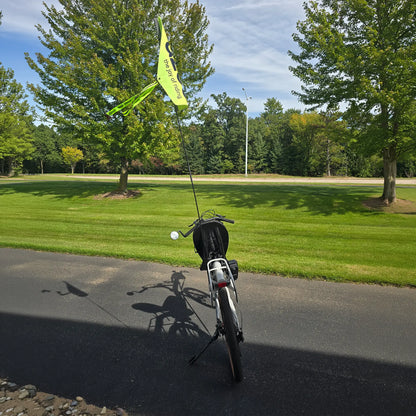 Rear view of the Azub Demo Six Bosch Performance CX Dynamic Grey Recumbent Bike in an outdoor setting.