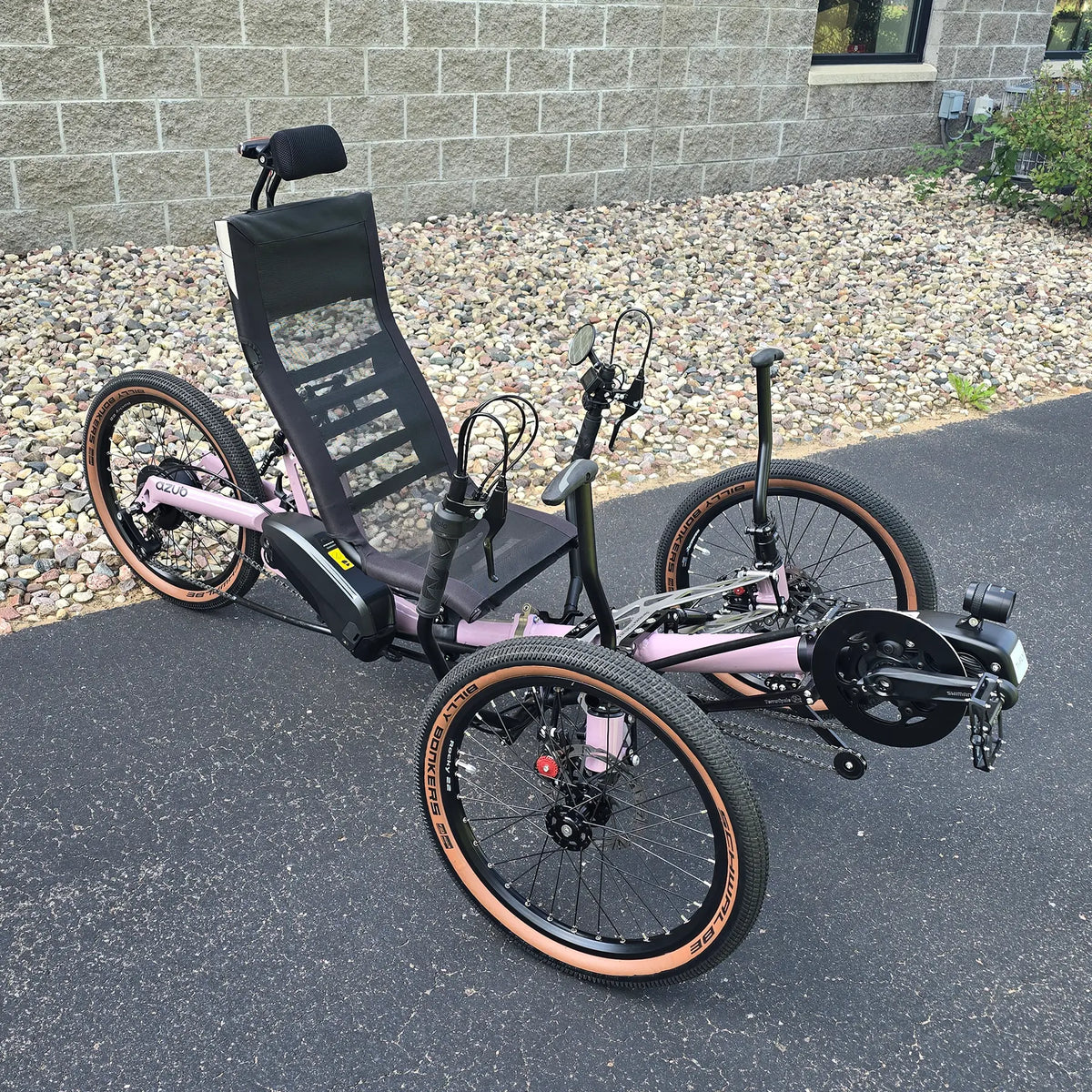 Angled side view of the Azub Demo Ti-Fly 20 Enviolo Shimano EP6 Pastel Violet Recumbent Trike in an outdoor setting.