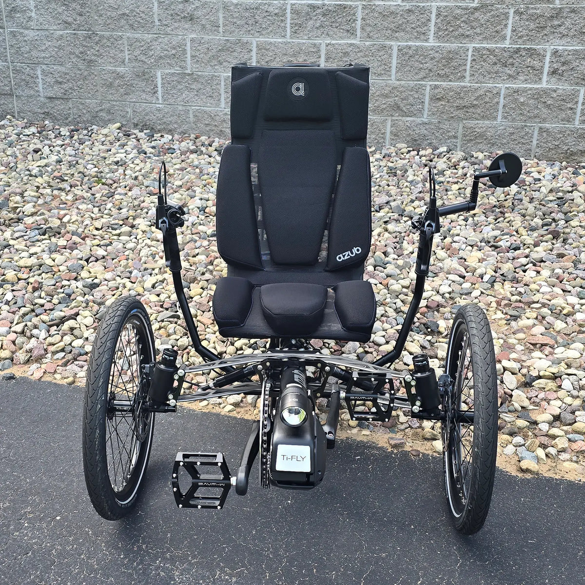 Front view of the Azub Demo Ti-Fly 26 Shimano EP6 Deep Black Recumbent Trike in an outdoor setting.