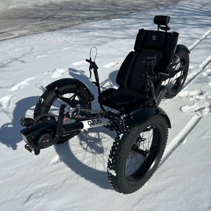 Azub Limited Edition Ti-Fly recumbent trike on a snowy path.