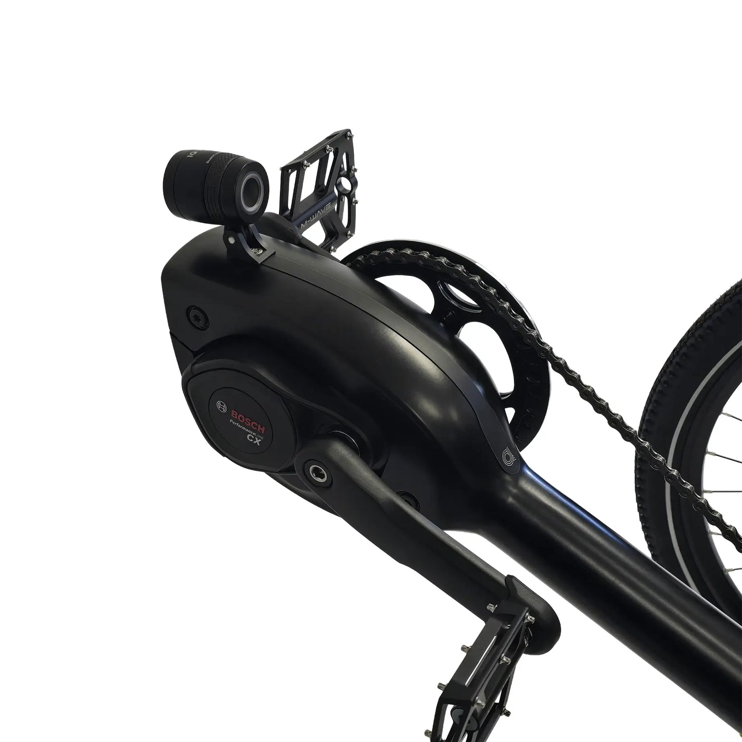 Closeup view of the Bosch Performance CX motor on the Azub Ti-Fly X  Bosch Performance CX 10 Speed Cues Neon Shiny Yellow Recumbent Trike against a white background.