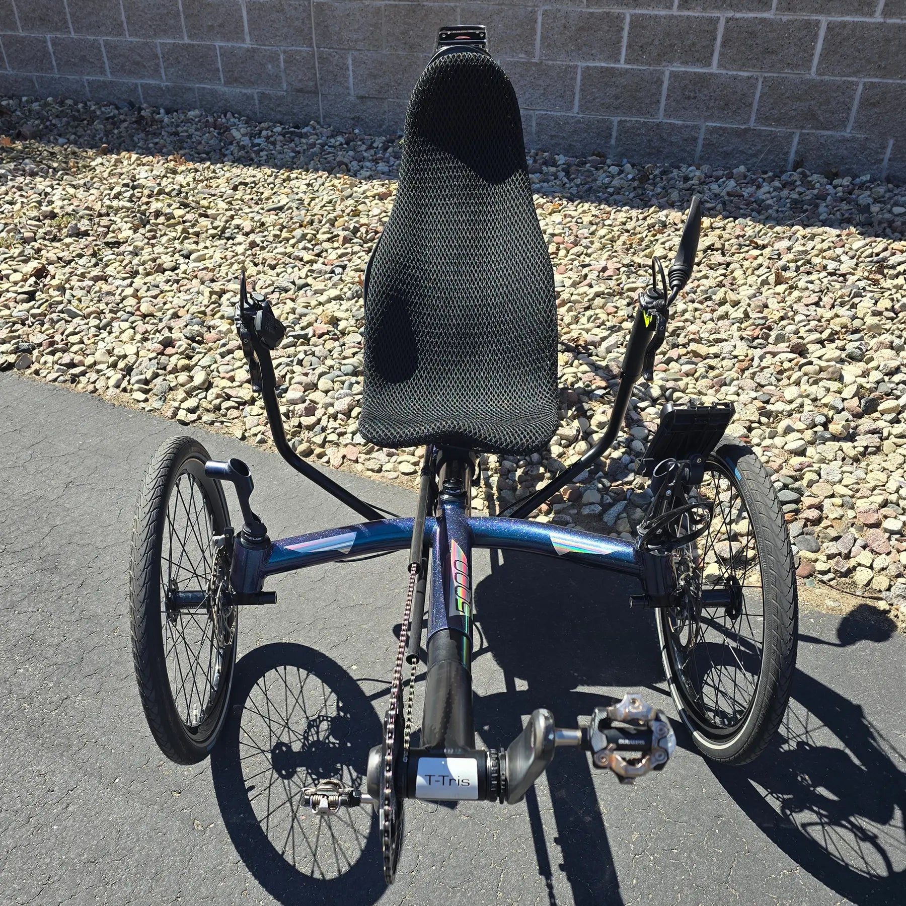 Front view of the Azub Used T-Tris 5000 Chameleon Teal Custom Recumbent Trike in an outdoor setting.