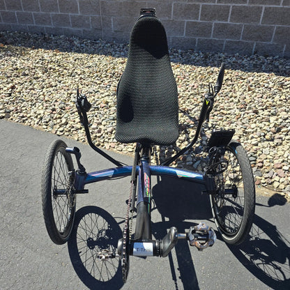 Front view of the Azub Used T-Tris 5000 Chameleon Teal Custom Recumbent Trike in an outdoor setting.