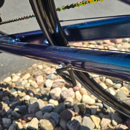 Closeup view of the flag mount on the Azub Used T-Tris 5000 Chameleon Teal Custom Recumbent Trike in an outdoor setting.