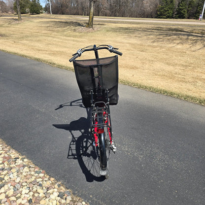Rear view of the Bacchetta Used Bella Red SM-MD Recumbent Bike in an outdoor setting.