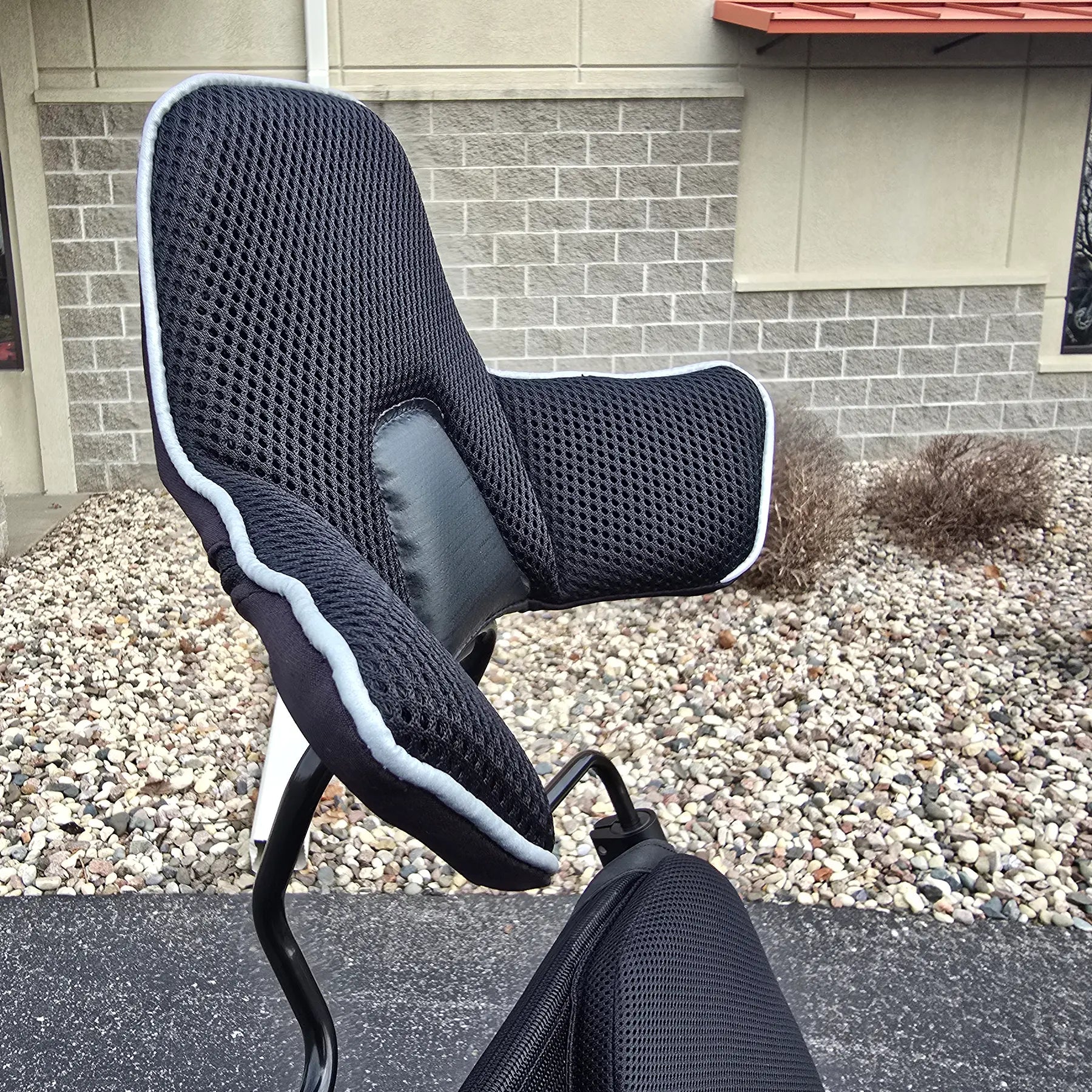Closeup view of the headrest on the BamBuk Independent Bosch Performance CX Recumbent Tandem Trike in the Hostel Shoppe parking lot.