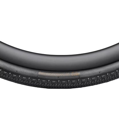 Closeup side profile view of the Bontrager Girona Comp Gravel Tire 700c x 42mm (42-622mm) against a white background.