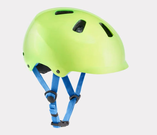 Green Bontrager Jet Wavecel helmet with blue straps on a light gray background.