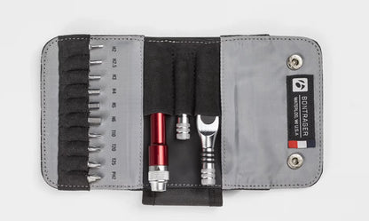 Open Bontrager Pro Ratchet Multi-tool l kit with various tools including a red screwdriver and wrench, on a white background.