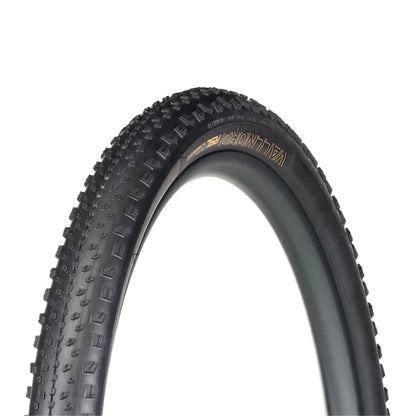 Angled side profile of the Bontrager Vallnord RSL XR TLR MTB Tire 29 x 2.40 inch (61-622mm) in black against a white background.