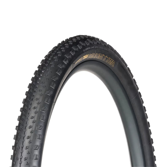 Angled side profile of the Bontrager Vallnord RSL XR TLR MTB Tire 29 x 2.40 inch (61-622mm) in black against a white background.