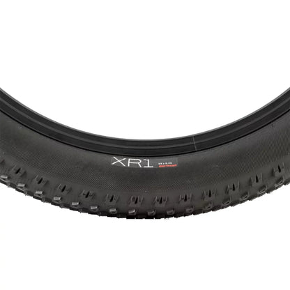 Closeup view of the side profile on the Bontrager XR1 Kids MTB Tire 20 x 2.25 inch (57-406mm) against a white background.