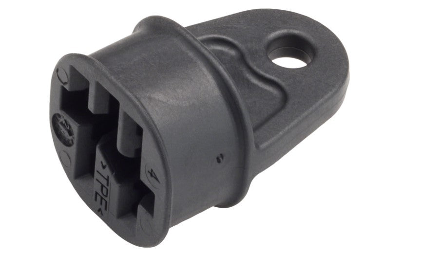 A black plastic Bosch battery port pin cover on a white background. 
