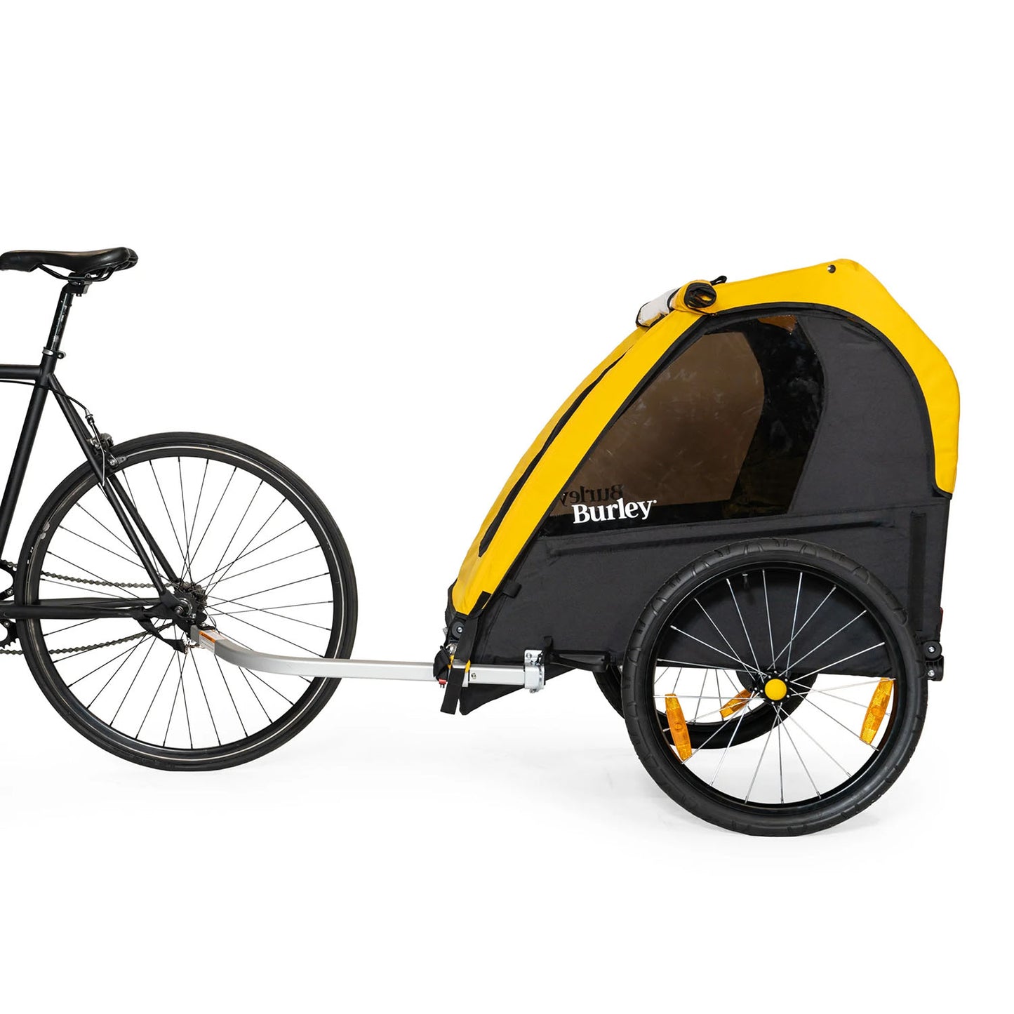 Side view of the Burley Bee Double Child Trailer in Yellow, mounted to the back wheel of a bike, on a white background.