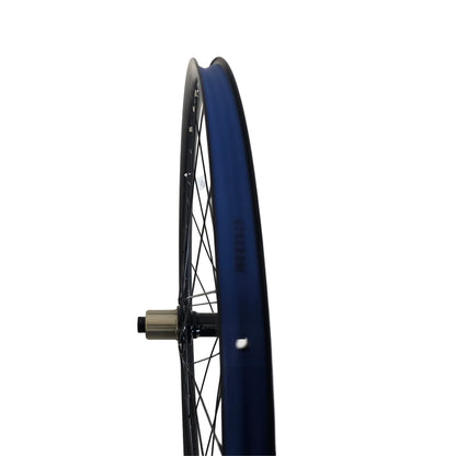 Rim profile of the Catrike 26 Inch Thru-Axle Rear Wheel with blue Rim Tape against a white background.