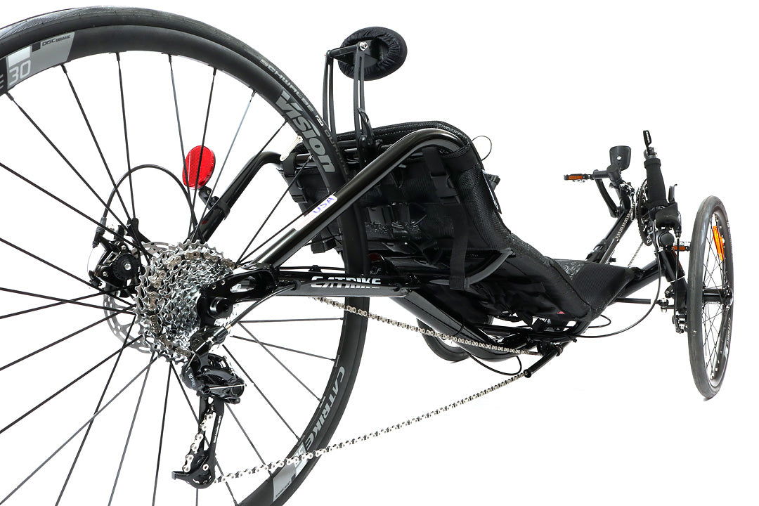 Back angled view of the Catike 700 Recumbent Trike in Liquid Black against a white background.