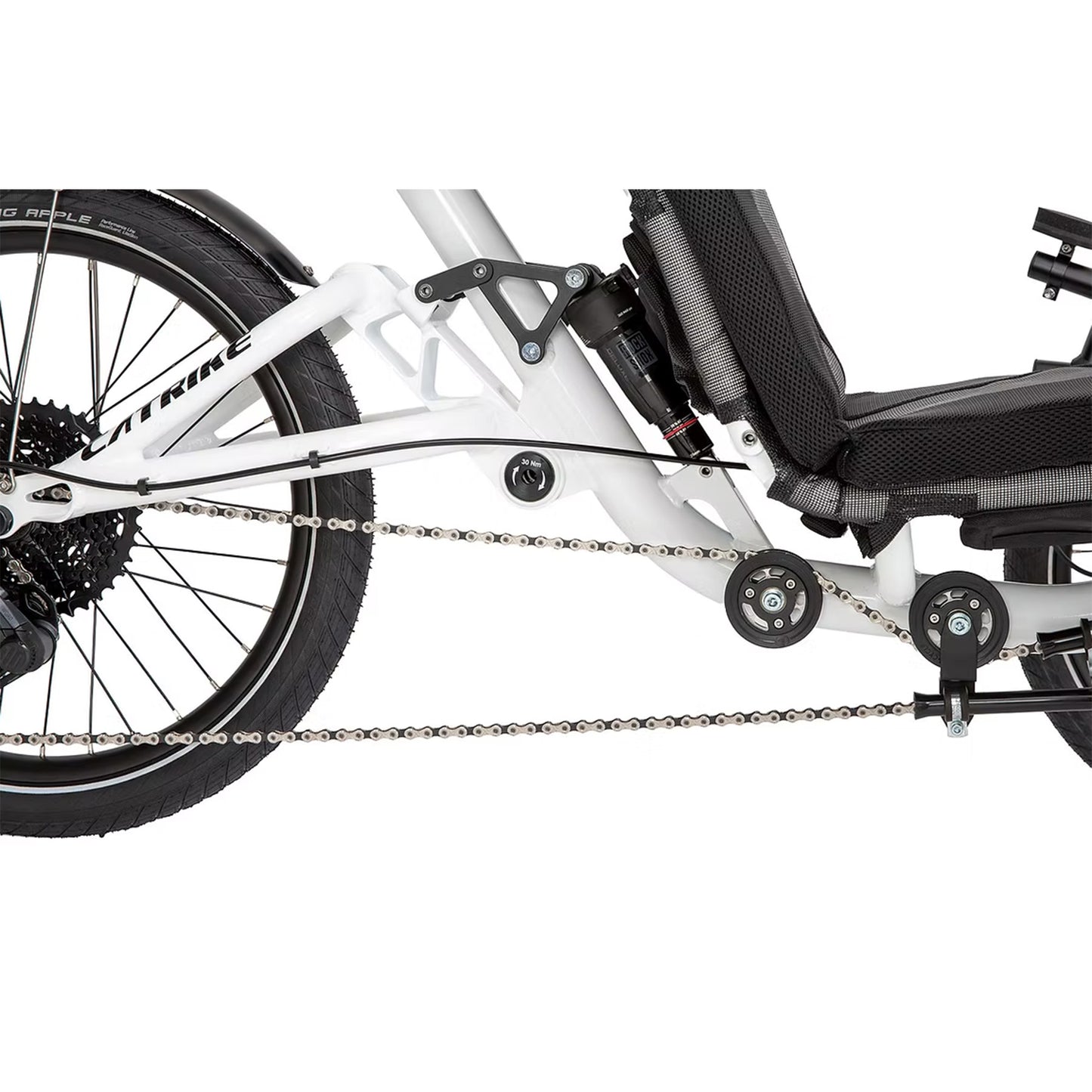Closeup view of the rear shock on the Catrike All Road in Star White.