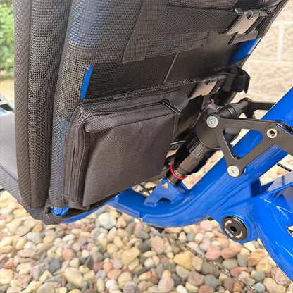 Closeup back view of the seat pouch and rear suspension on the Catrike Demo All Road eCat with Bosch BES3 Electric Blue Recumbent Trike in an outdoor setting.