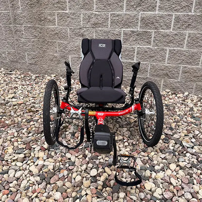 Front view of the ICE Demo Sprint Pixel RS STEPS EP6 Passion Red Recumbent Trike in an outdoor setting.
