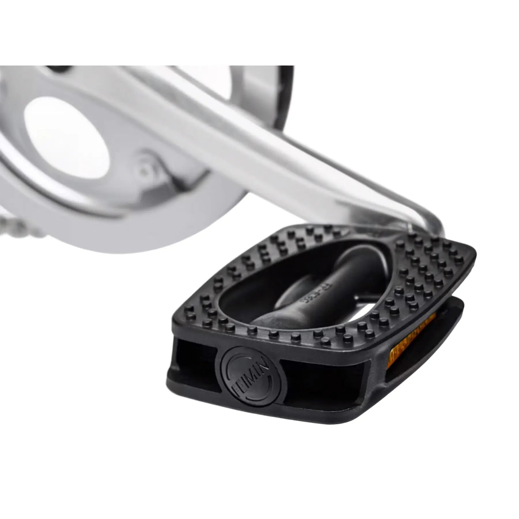 Closeup view of the pedal on the Electra Townie 7D Step-Thru 26 Inch Wheeled Bike in Rain, a light blue color, against a white background.