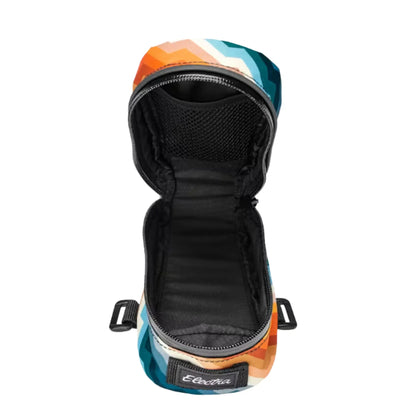 Inside view of the Electra Ziggy Brown-Dusk Saddle Bag in a geometric orange, teal and off-white pattern against a white background.