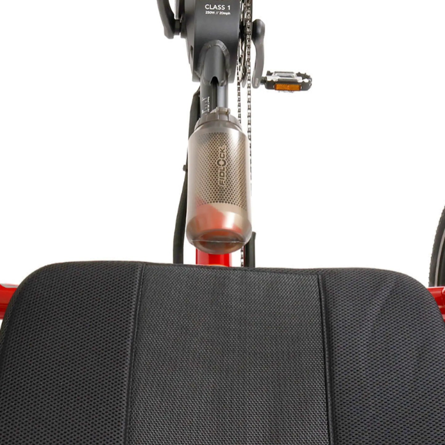 Back view of the Fidlock TWIST 750 Compact Single Bottle in Smoke mounted on a red recumbent trike against a white background.