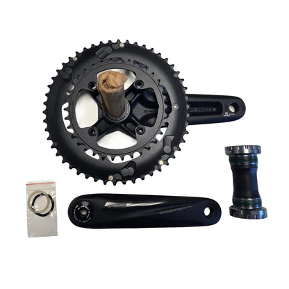 Inside view of the Full Speed Ahead Gossamer Pro 34-50t Crankset with 165mm Crankarms and External Bottom Bracket against a white background.
