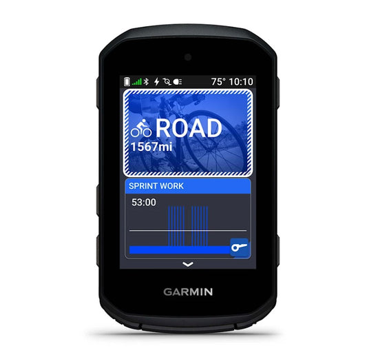 Black Garmin Edge 550 device with a screen displaying cycling metrics on a white background