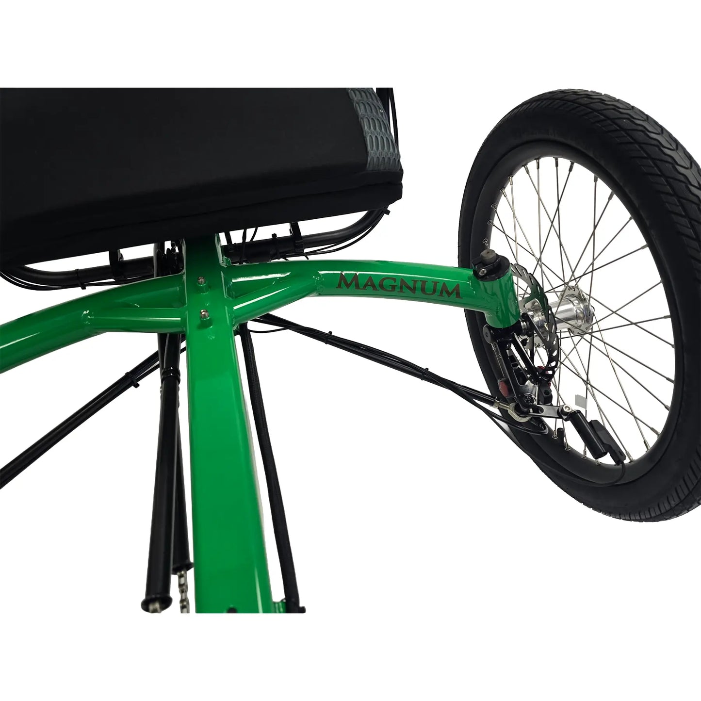 Closeup view of the Bosch speed sensor and the Magnum logo on the Greenspeed Magnum XL Bosch e-Plus Recumbent Trike in Speed Green against a white background.