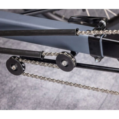 Closeup view of the Greenspeed Magnum XL Recumbent Trike Chain Gobbler (quick adjust) against a grey background.