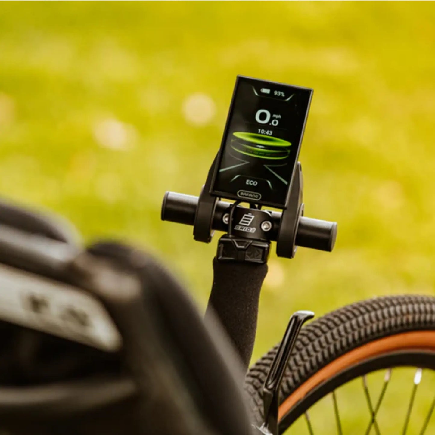 Closeup view of the controller on the GRIDE Solutions GXT Plus E-Trike Drive System for 20 inch Rear Wheels mounted on an ICE trike in an outdoor setting.
