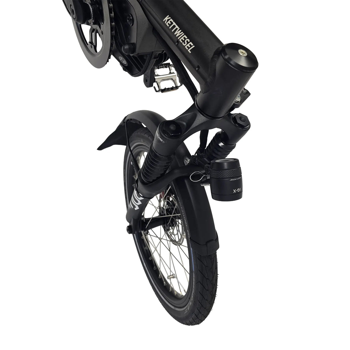Closeup view of the headlight, fender,  front suspension and wheel on the Hase Kettwiesel One Plus Enviolo Bosch Performance CX Pale Green Recumbent Trike against a white background.