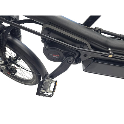 Closeup view of the Bosch motor on the Hase Kettwiesel One Plus Enviolo Bosch Performance CX Pale Green Recumbent Trike against a white background.