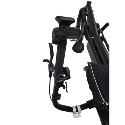 Closeup view of the Bosch controller and bell on the handlebar on the Hase Kettwiesel One Plus Enviolo Bosch Performance CX Pale Green Recumbent Trike against a white background.