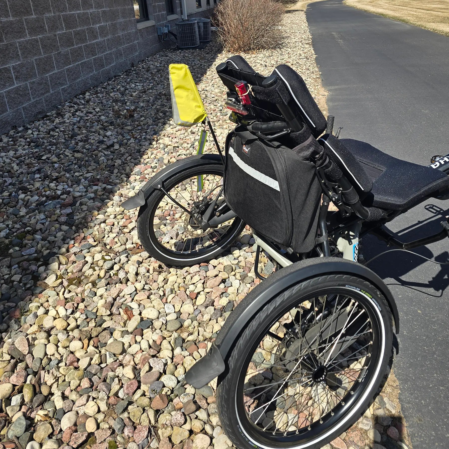 Closeup view of the back of the Hase Used 2022 Kettwiesel Evo Steps 6100 with 630wh Battery and 2A Charger Recumbent Trike in an outdoor setting.