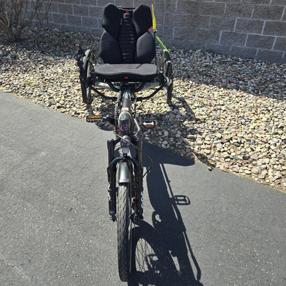 Front view of the Hase Used 2022 Kettwiesel Evo Steps 6100 with 630wh Battery and 2A Charger Recumbent Trike in an outdoor setting.