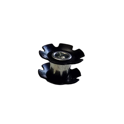 Angled side view of the Hostel Shoppe 1 inch Star Nut for Headsets against a white background.