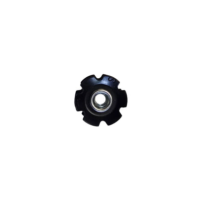 Top view of the Hostel Shoppe 1 inch Star Nut for Headsets against a white background.