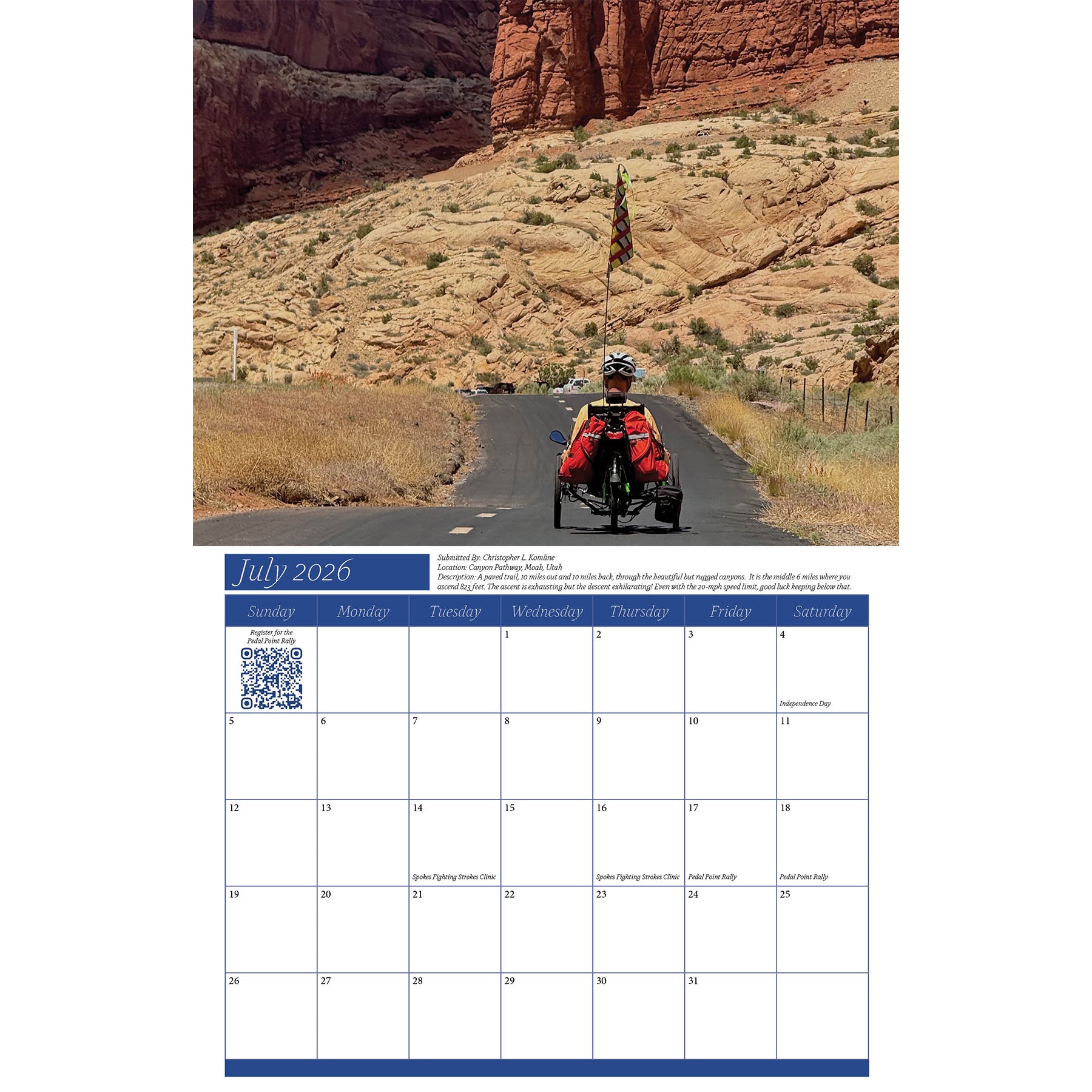 Calendar page for July 2026 with a desert landscape and person on a recumbent trike.