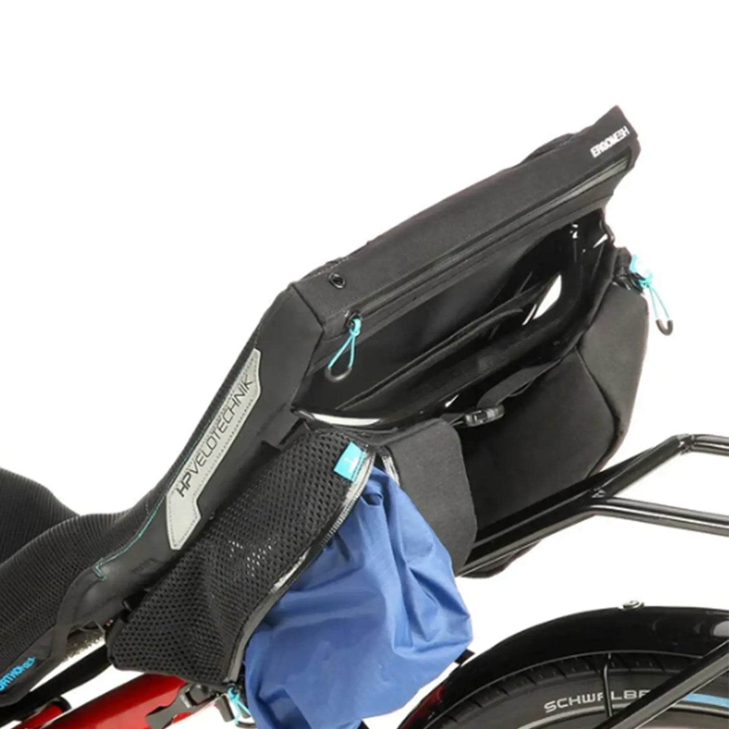 Closeup view of the mesh bag holding an optional rain cover on the HP Velotechnik Add-On Bags for Mesh Seat in black mounted on a trike.