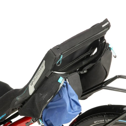 Closeup view of the mesh bag holding an optional rain cover on the HP Velotechnik Add-On Bags for Mesh Seat in black mounted on a trike.
