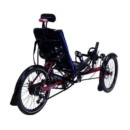 Rear angled view of the HP Velotechnik Gekko fxs Magma Red Recumbent Trike with Accessories against a white background.