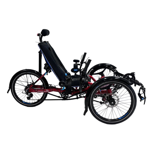 Side view of the HP Velotechnik Gekko fxs Magma Red Recumbent Trike with Accessories against a white background.